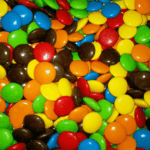 Lenteja de Chocolate Multicolor  Rocklets  Por 250 Gr