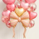 Set Super de Globos COQUETTE MOÑO RAYADO ROSA 16 Piezas.